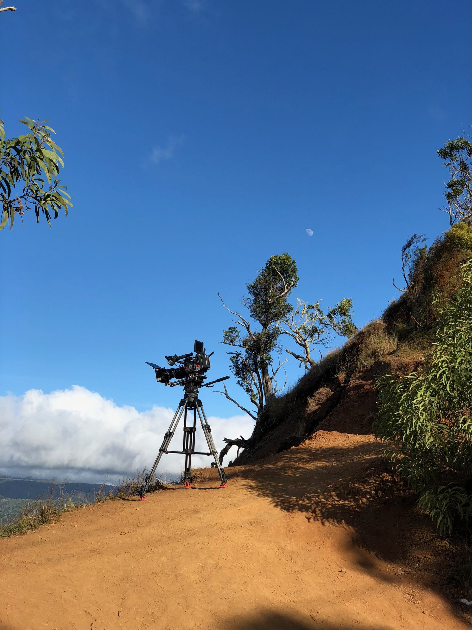 Camera on a tripod on a ridge trail